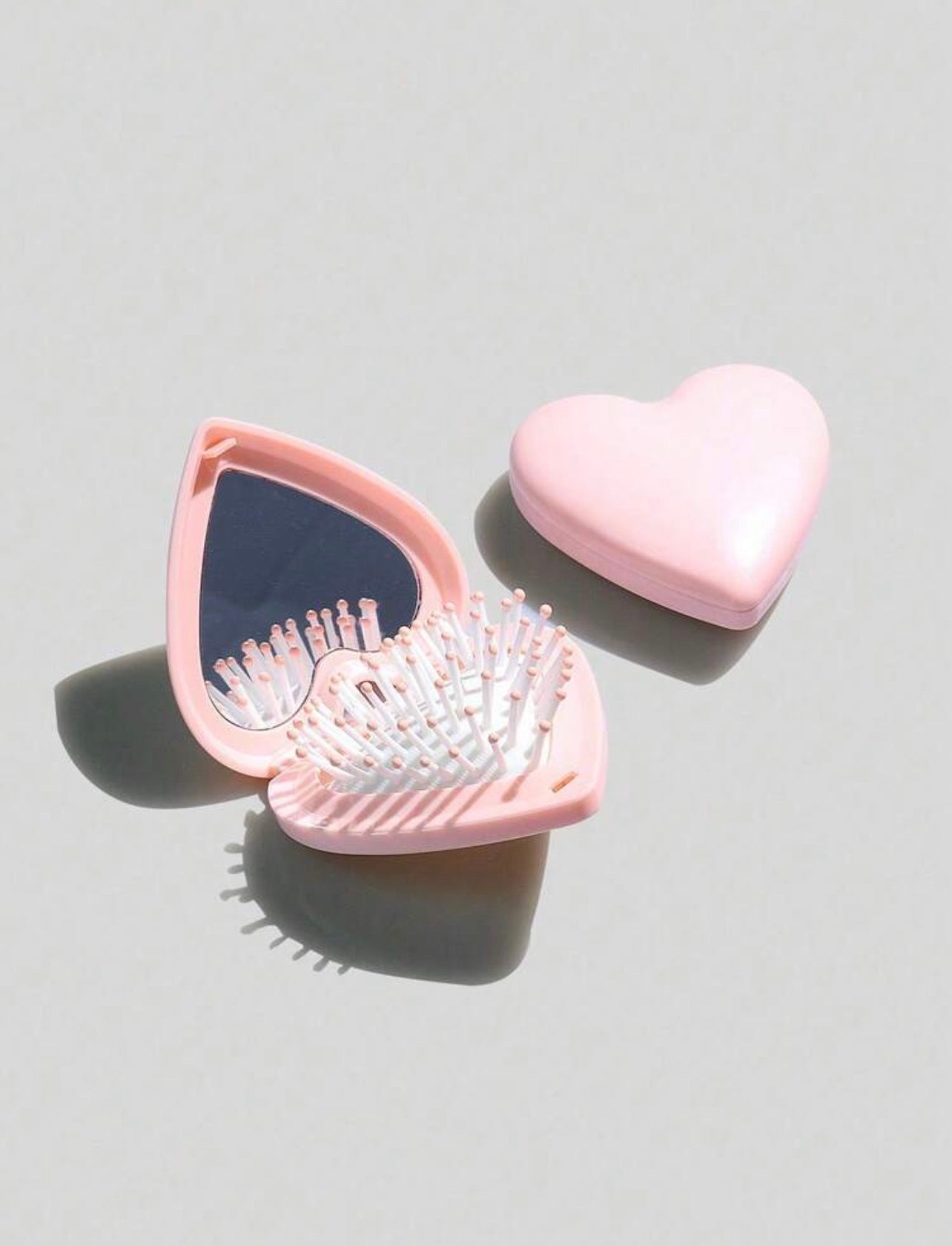 Heart shaped brush/mirror